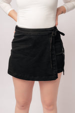 Load image into Gallery viewer, Bentli High Rise Side Tie Denim Skort in Black
