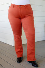 Load image into Gallery viewer, Autumn Mid Rise Slim Bootcut Jeans in Terracotta
