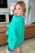 Load image into Gallery viewer, Airflow Peplum Ruffle Sleeve Top in Emerald
