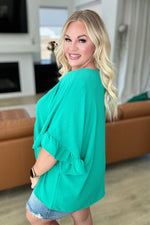 Load image into Gallery viewer, Airflow Peplum Ruffle Sleeve Top in Emerald
