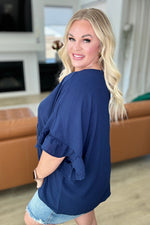 Load image into Gallery viewer, Airflow Peplum Ruffle Sleeve Top in Navy

