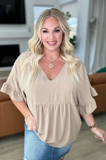Load image into Gallery viewer, Airflow Peplum Ruffle Sleeve Top in Taupe
