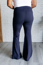 Load image into Gallery viewer, Stamina Stride Flare Leggings in Navy
