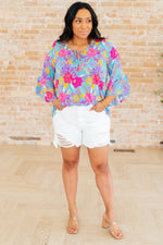 Load image into Gallery viewer, Willow Bell Sleeve Top in Bright Blue Floral
