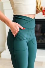 Load image into Gallery viewer, Work it All Out Crossover Flare Leggings
