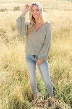 Load image into Gallery viewer, Bellissimo Draped V-Neck Sweater in Olive
