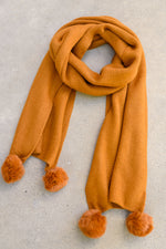 Load image into Gallery viewer, Knitted Fuzzy Pom Pom Scarf In Ginger
