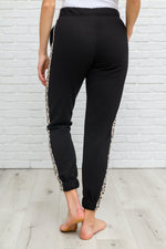 Load image into Gallery viewer, Side Panel Animal Print Sweatpants In Black
